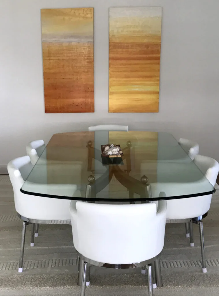 "Golden Seas" paintings in a Longboat Key condo.
